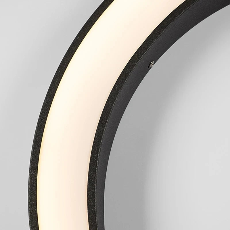 Modern Circular Outdoor Wall Light for Patios and Contemporary Porch Decor
