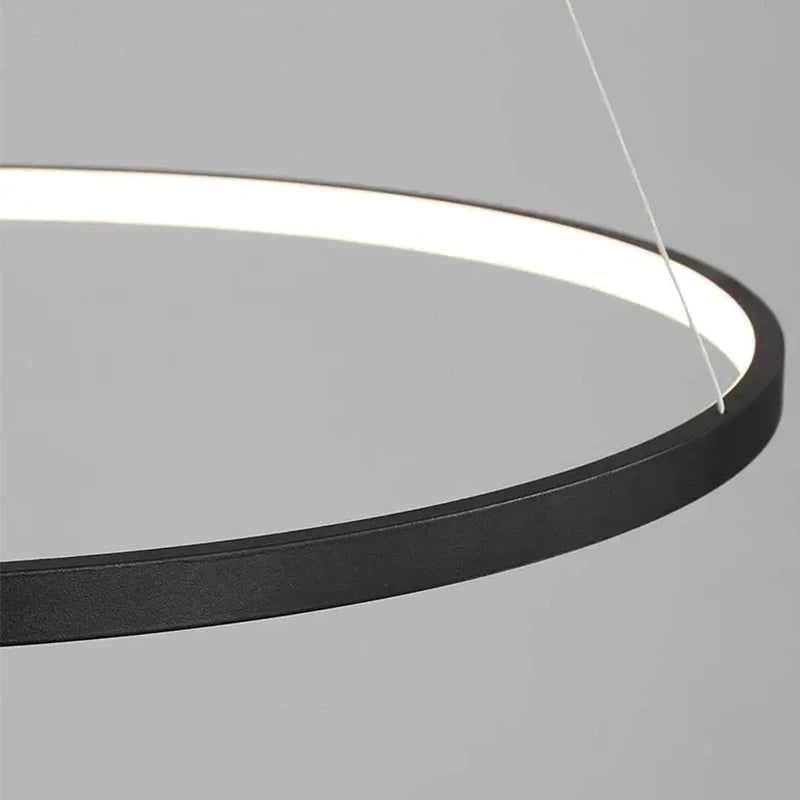 Minimalist Round LED Pendant Light for Modern Living Rooms and Restaurants