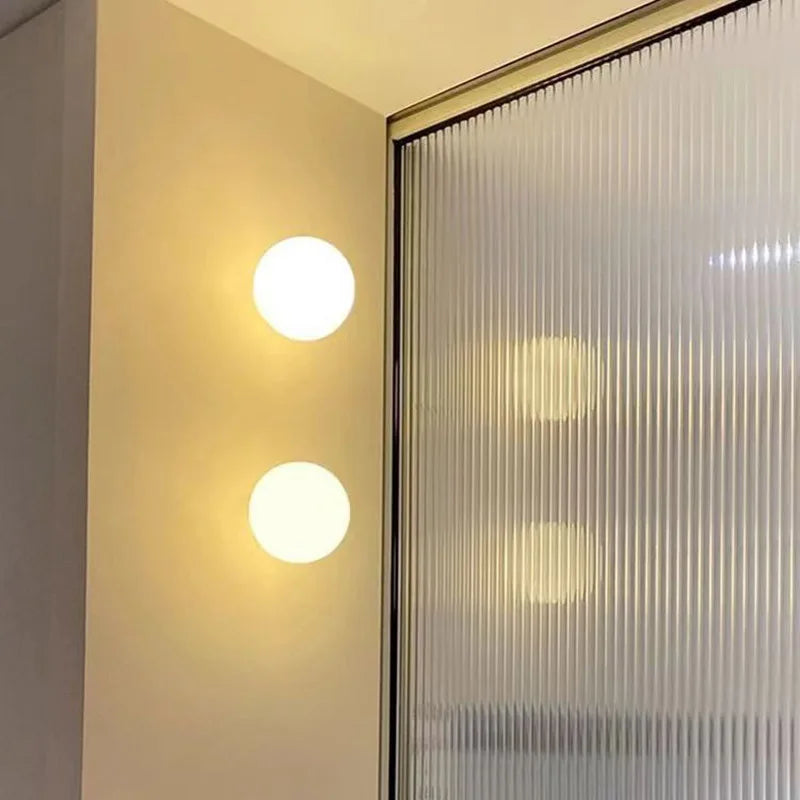Modern Frosted Glass Globe Wall Sconce for Hallways and Living Rooms