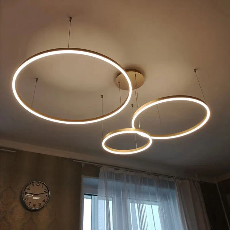 Modern LED Ring Chandelier in Brushed Gold and Black for Dining Spaces
