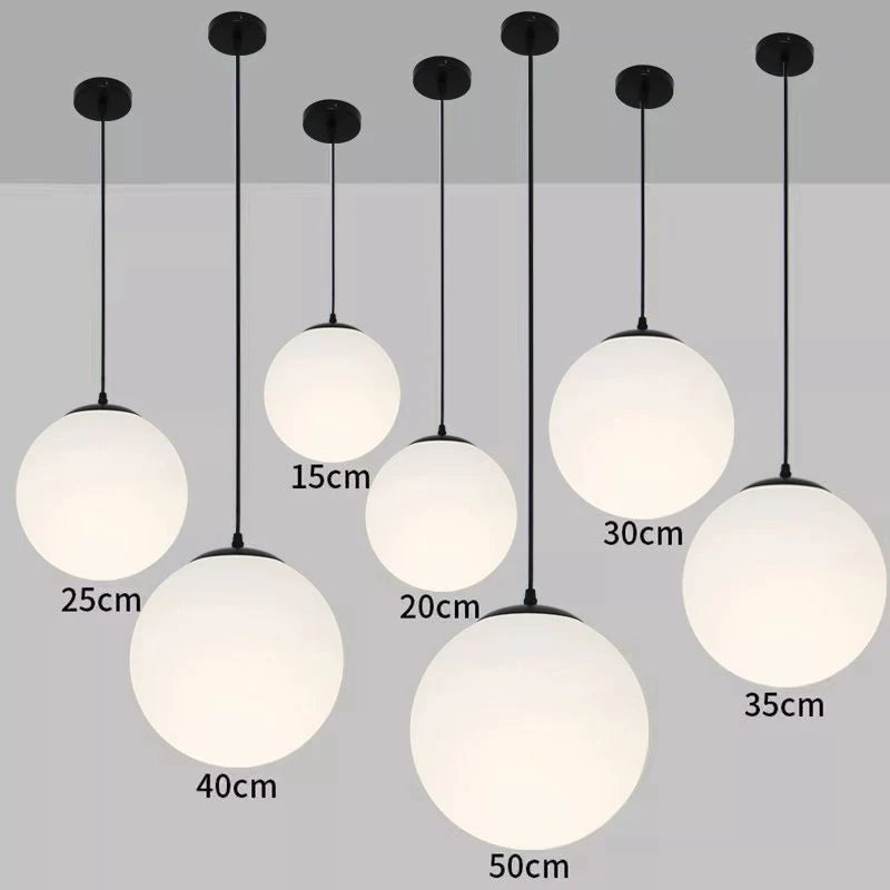 Nordic Glass Globe Pendant Light in Brass for Modern Dining Rooms